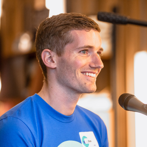 Jim van der Waal, Head of Product at Polarsteps, speaking into a microphone